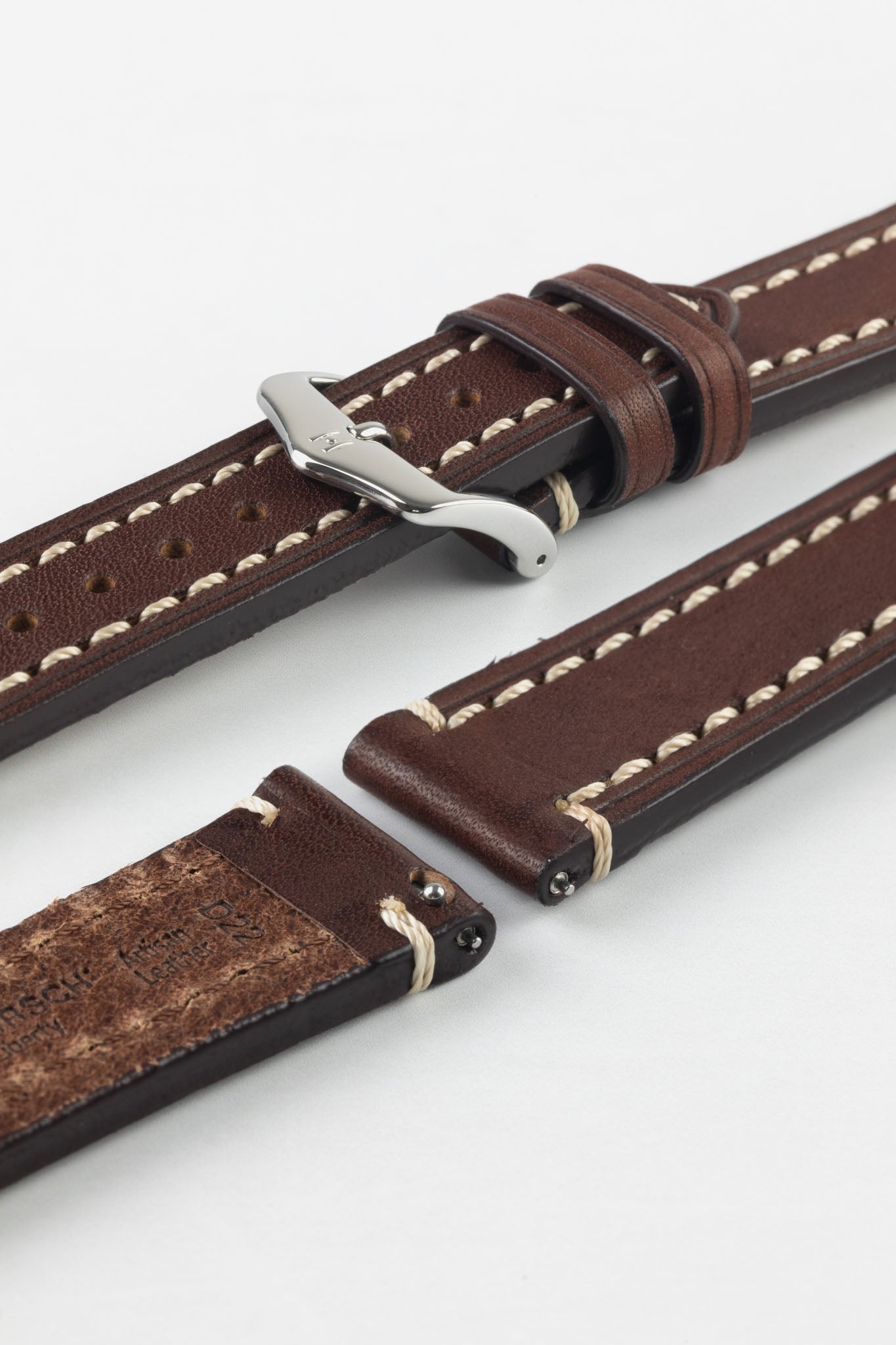 Made in Spain heavy silver tone brown leather belt.